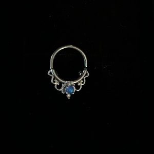 Opal, septum ring.